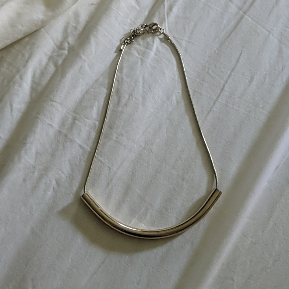 Gold colored necklace